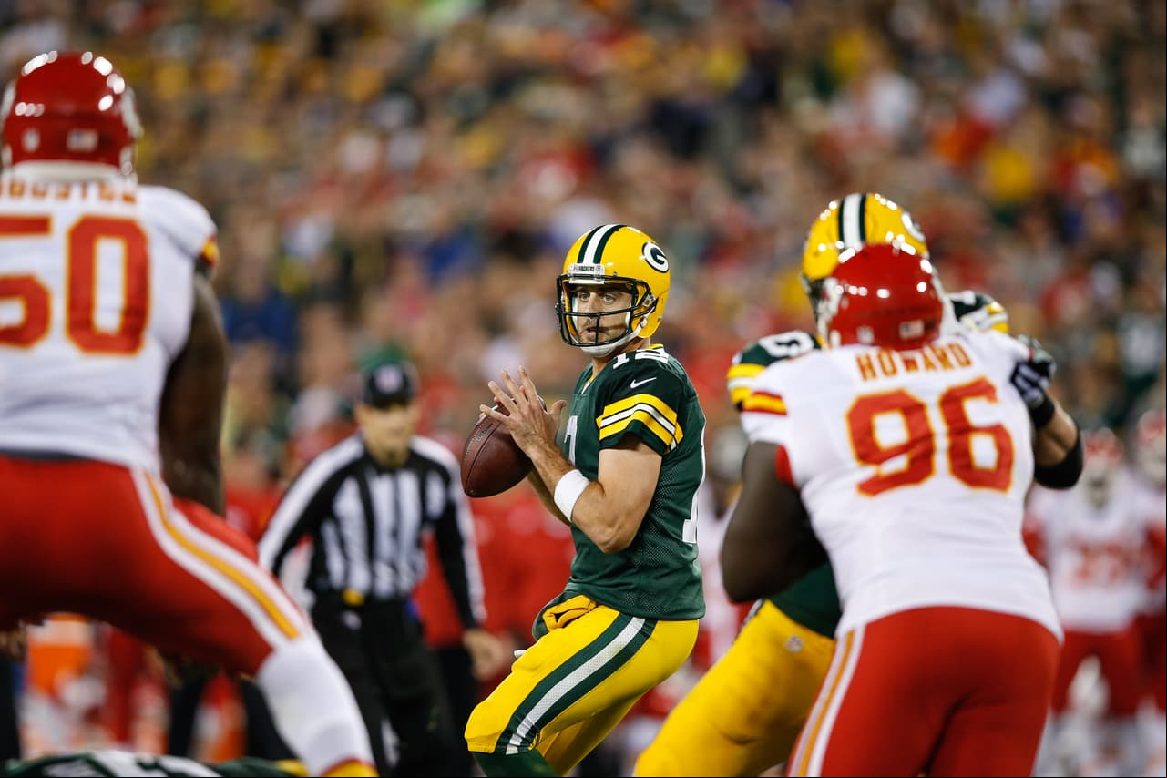 GREEN BAY, WI - SEPTEMBER 28: Quarterback Aaron Rodgers #12 of the Green Bay Packers looks to  the football against the Kansas City Chiefs in the second half at Lambeau Field on September 28, 2015 in Green Bay, Wisconsin. The Green Bay Packers defeat the Kansas City Chiefs 38-28. (Photo by Joe Robbins/Getty Images)